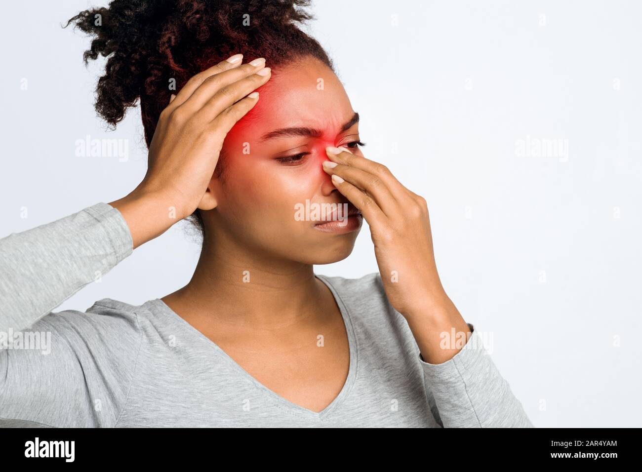 Woman rubbing nose girl hires stock photography and images Alamy