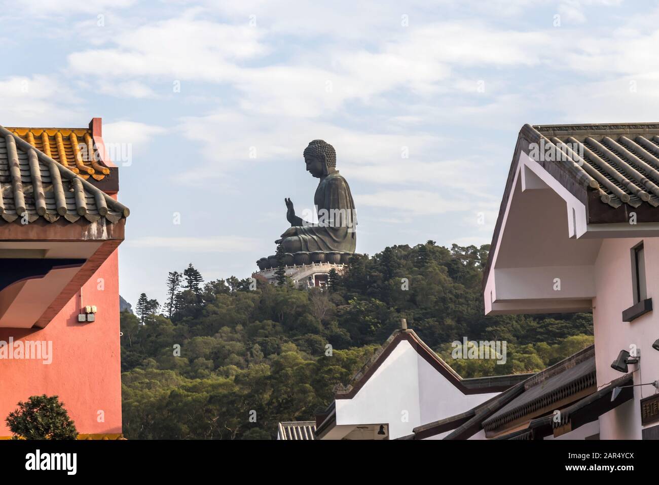 Tian Tan Buddha (Big Buddha) as seen from Ngong Ping Village, Lantau Island, Hong Kong Stock Photo