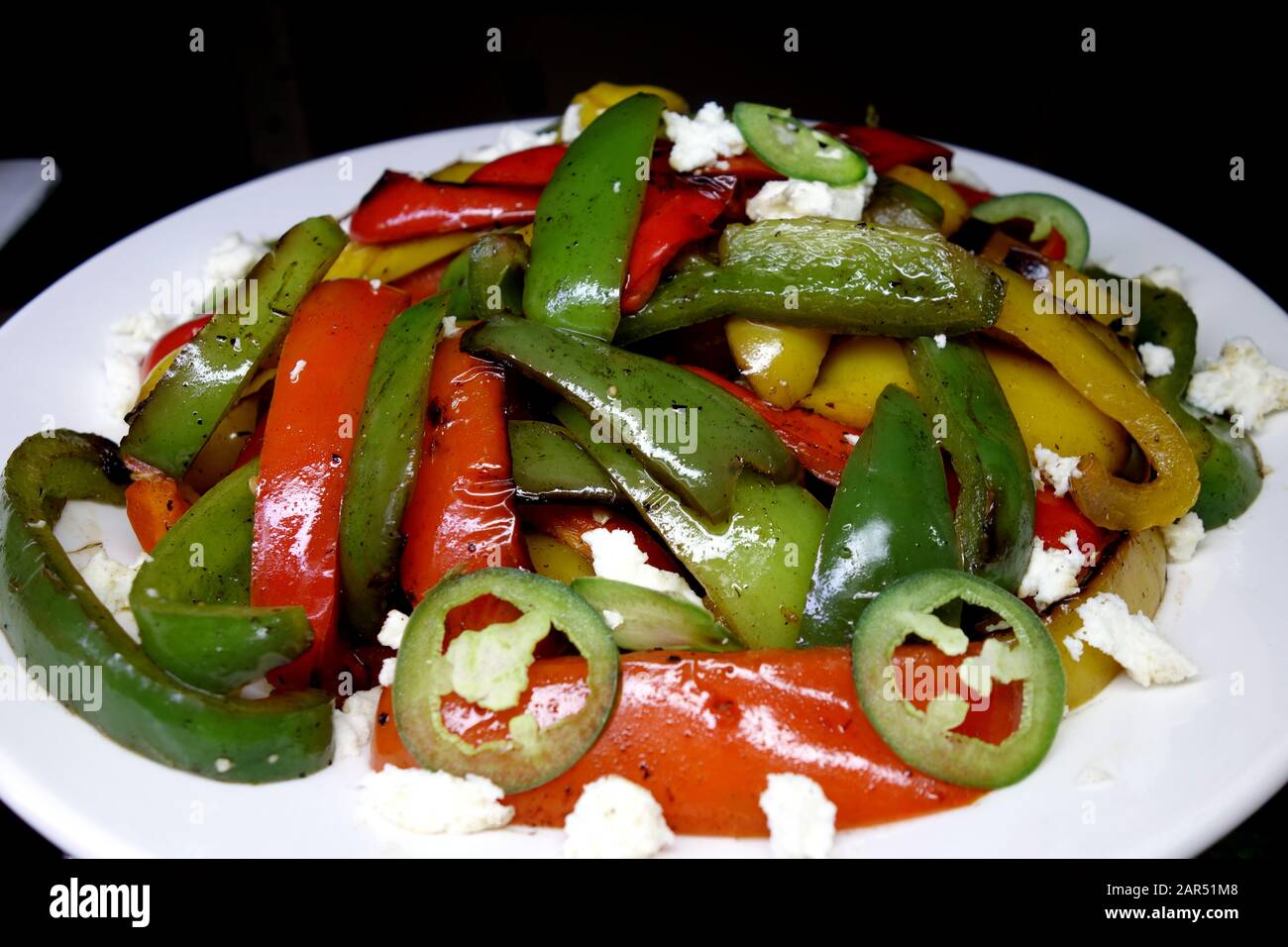 Red/Green Roasted Peppers with Feta cheese & Jalapeño Chilies Salad on Display in the Buffet at the Azul Beach Resort Hotel, Puerto Morelos. Stock Photo