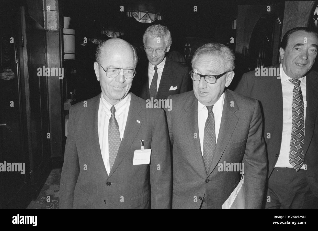 Global Economic Panel Amsterdam, 1989. Left to right: Wisse Dekker (Philips), Hans van den Broek, Henry Kissinger and Robert Maxwell; Stock Photo