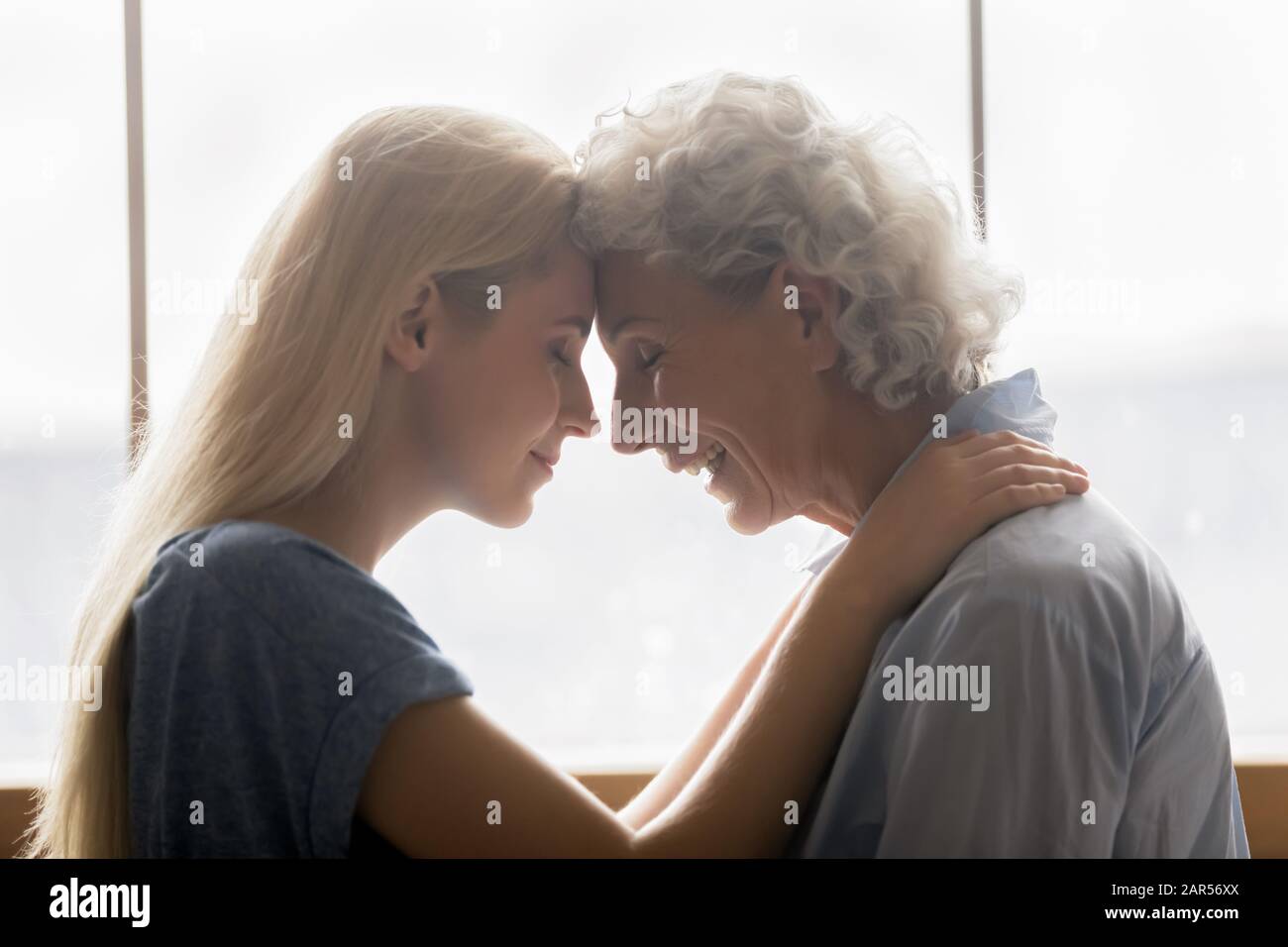 Loving two generations family with trustful relations. Stock Photo