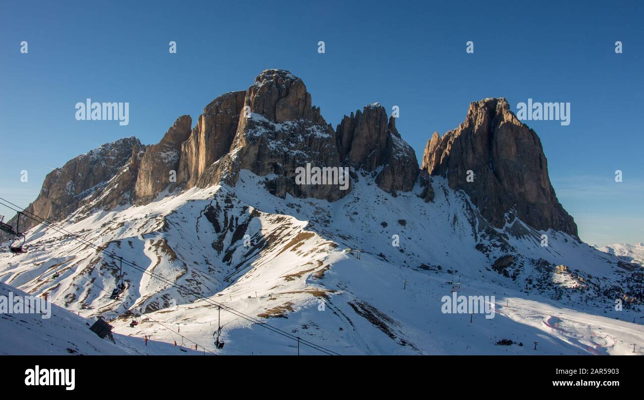 Italy Dolomites Langkofel skiing area wolkenstein sunset view cabin Winter Mountains Landscape Italian alpes Stock Photo