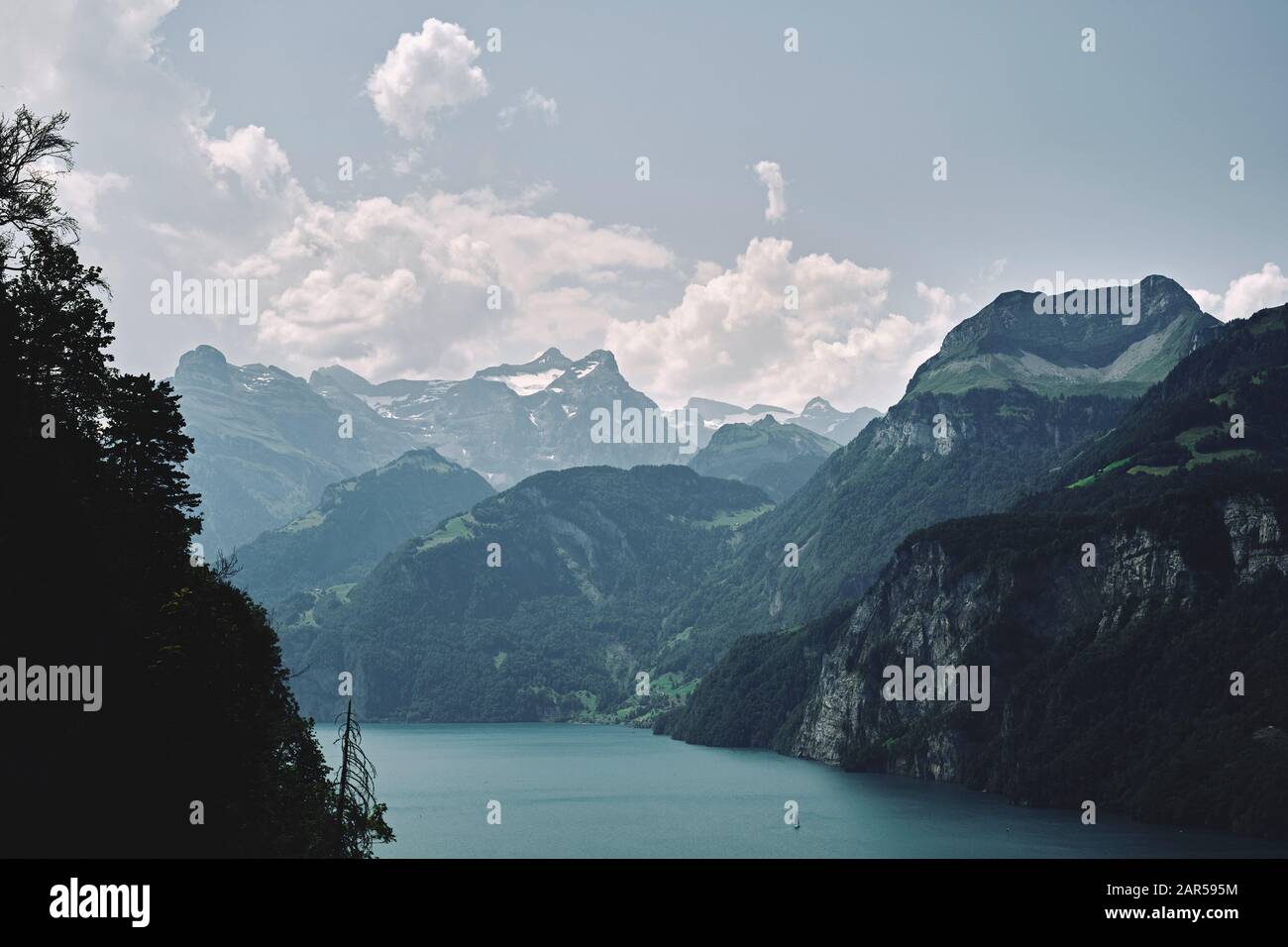 A Swiss Alps lake and mountain panorama summer landscape of Lake Lucerne, near Brunnen, Schwyz, Switzerland EU Stock Photo