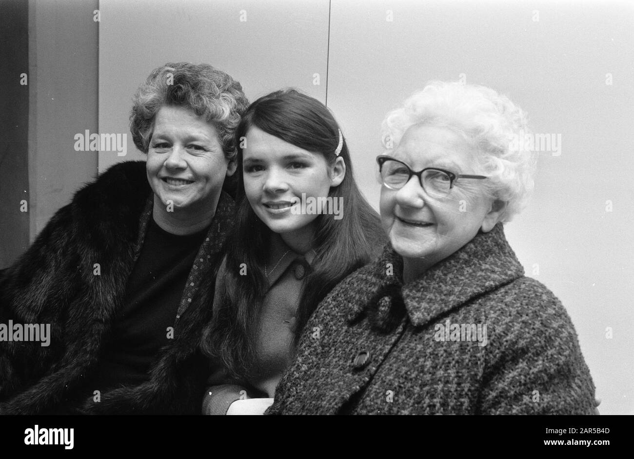 Eurovision Song Contest 1970 in RAI Amsterdam  Irish singer Dana arrives at Schiphol for Eurovision Song Festival. Dana with mother and grandmother Date: 16 March 1970 Location: Noord-Holland, Schiphol Keywords: song festivals, singers Personal name: Dana Institution name: Eurovision Song Contest Stock Photo