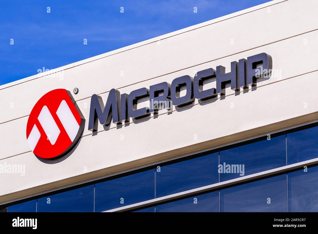 Jan 24, 2020 Sunnyvale / CA / USA - Microchip sign at their HQ in Silicon Valley; Microchip Technology Inc. manufactures microcontrollers, mixed-signa Stock Photo