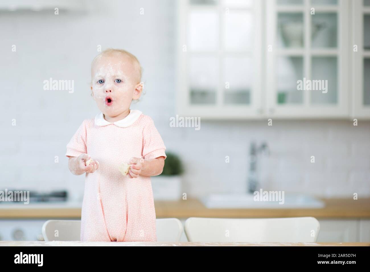 Flour on face kid hi-res stock photography and images - Alamy