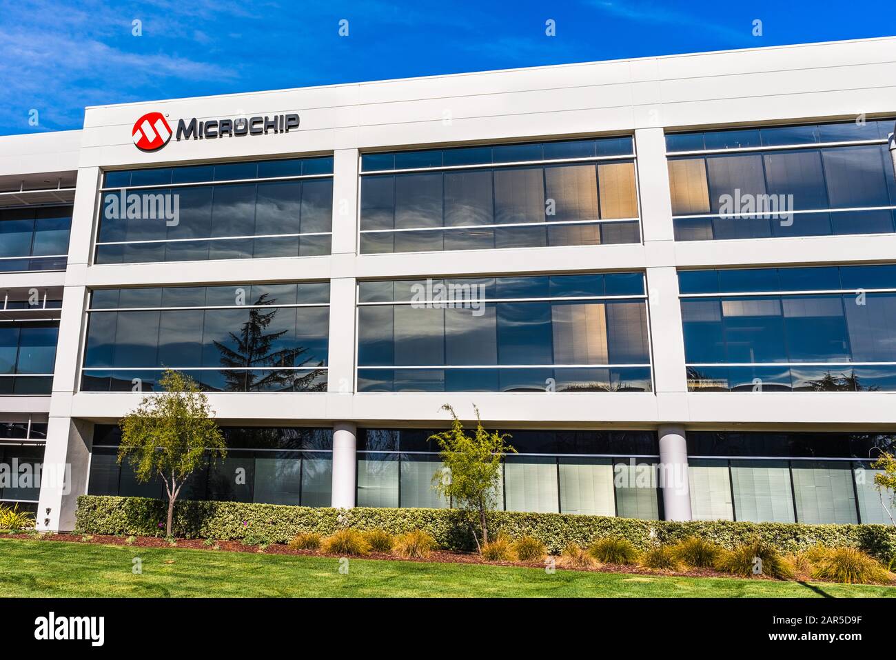 Jan 24, 2020 Sunnyvale / CA / USA - Microchip headquarters in Silicon Valley; Microchip Technology Inc. manufactures microcontrollers, mixed-signal, a Stock Photo
