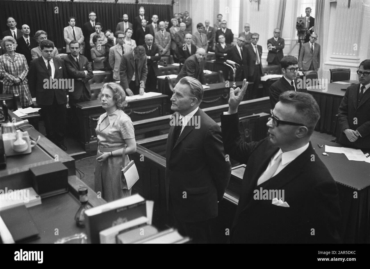 Installation of new members of the House of Representatives in The Hague, including PvDA-MP A.M.C. Padt-Jansen (l) Date: June 3, 1969 Location: The Hague, Zuid-Holland Keywords: office acceptions, parliamentarians, political Person name: Padt-Jansen, Annemiek Institutional name: House Stock Photo