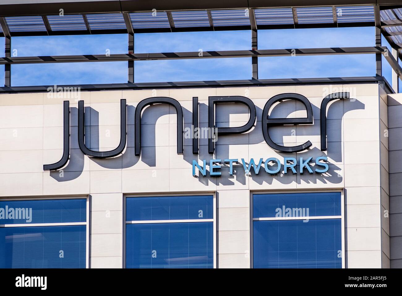 Jan 24, 2020 Sunnyvale / CA / USA - Juniper Networks sign at the Company's corporate headquarters located in Silicon Valley. Juniper Networks, Inc. is Stock Photo
