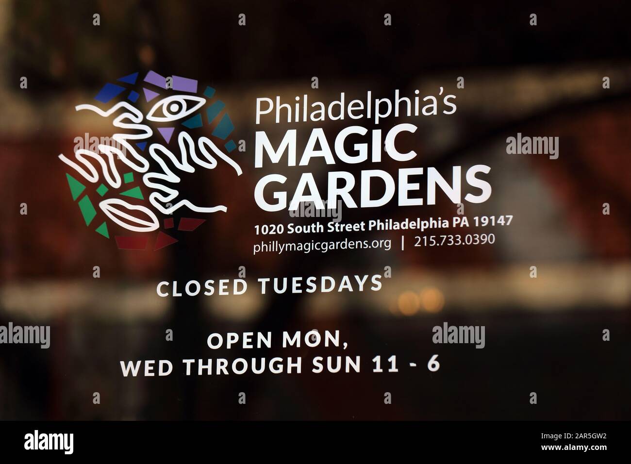 Signage on a door into Philadelphia's Magic Gardens, 1020 South St, Philadelphia, PA. Stock Photo