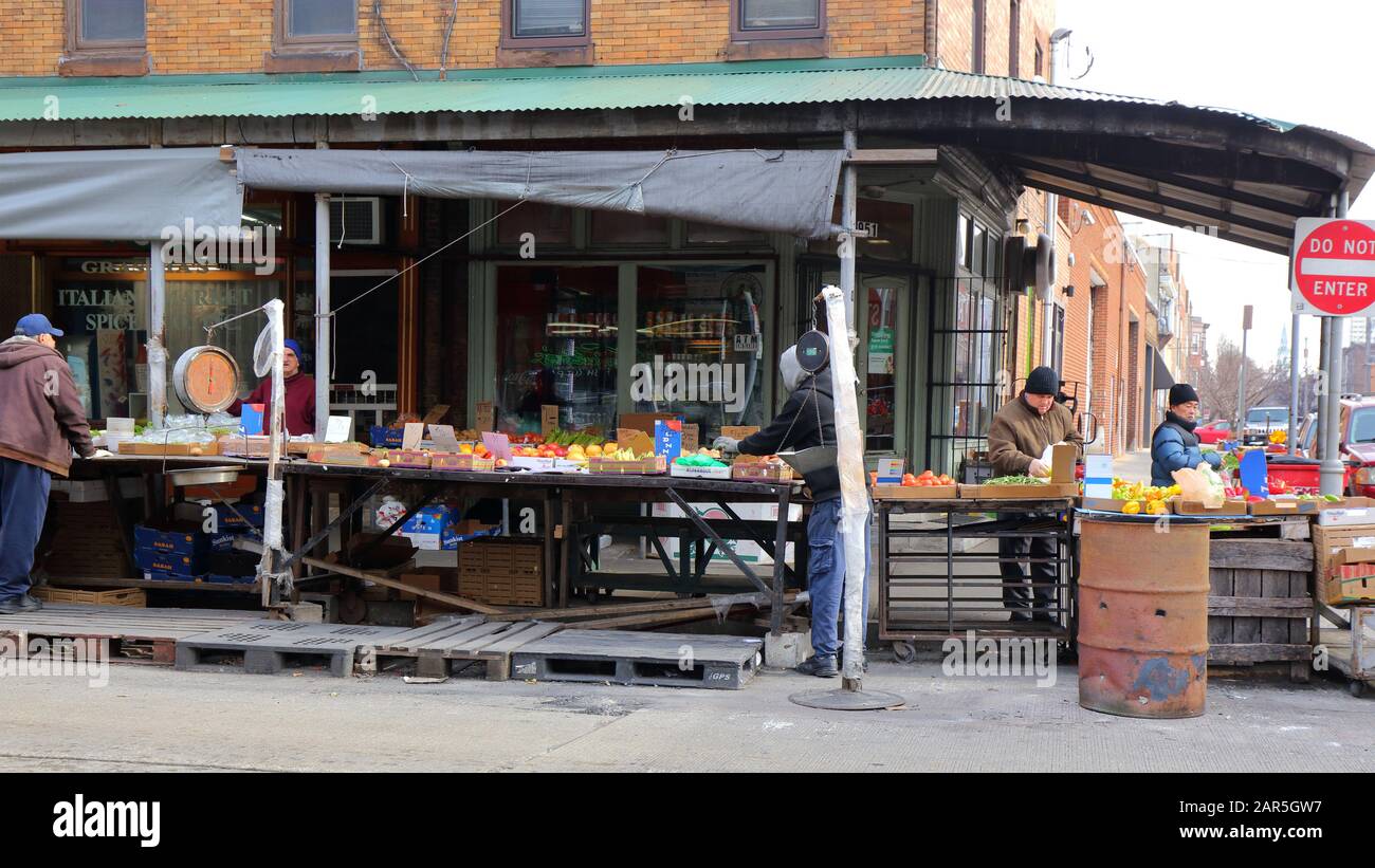 Fruit vendors and shoppers in the Italian Market, South 9th St, Philadelphia, PA. (January 23, 2020) Stock Photo