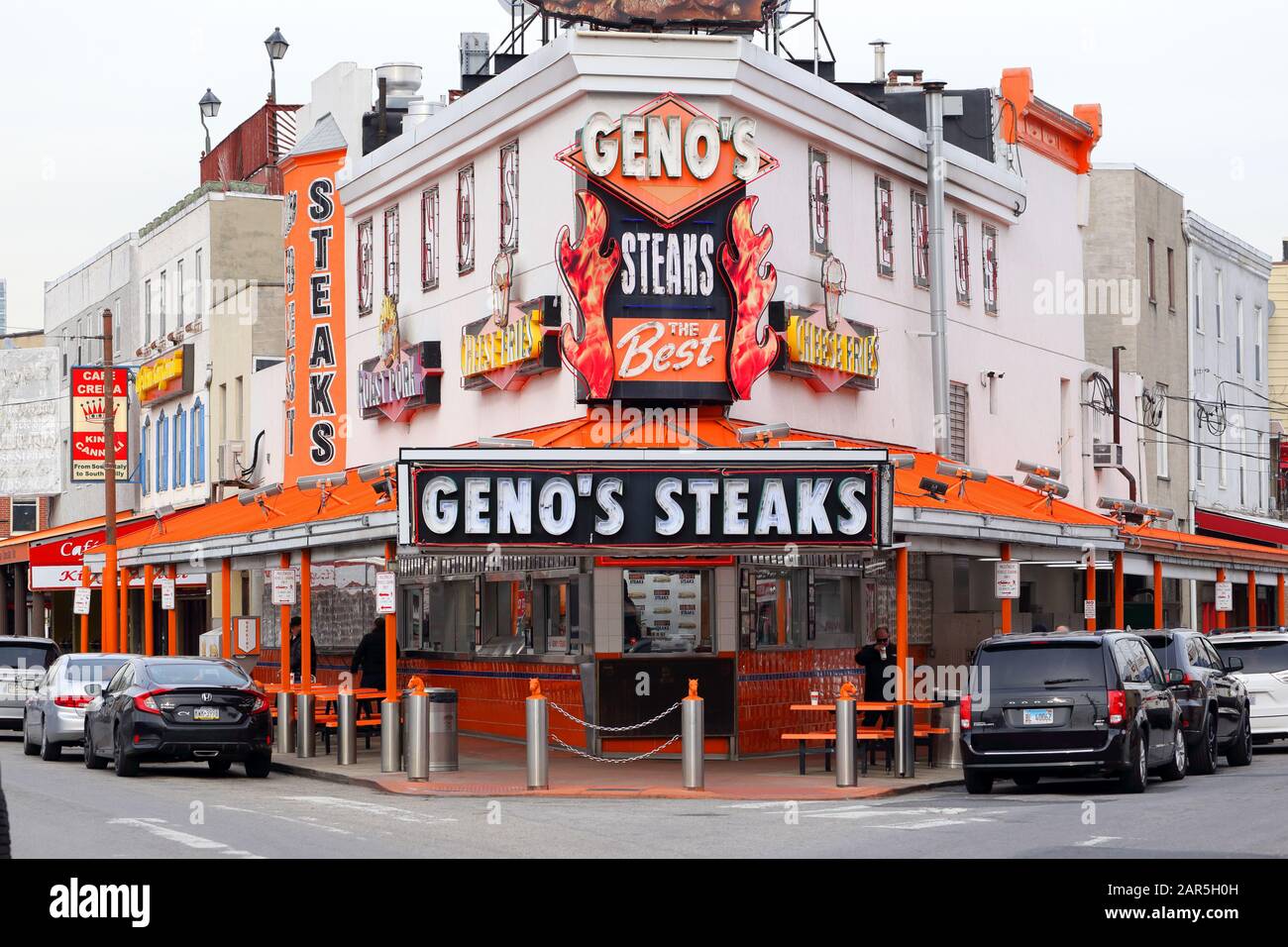 Geno's Steaks, 1219 S 9th St, Philadelphia, PA. exterior storefront of a cheesesteak eatery in Passyunk Square. Stock Photo