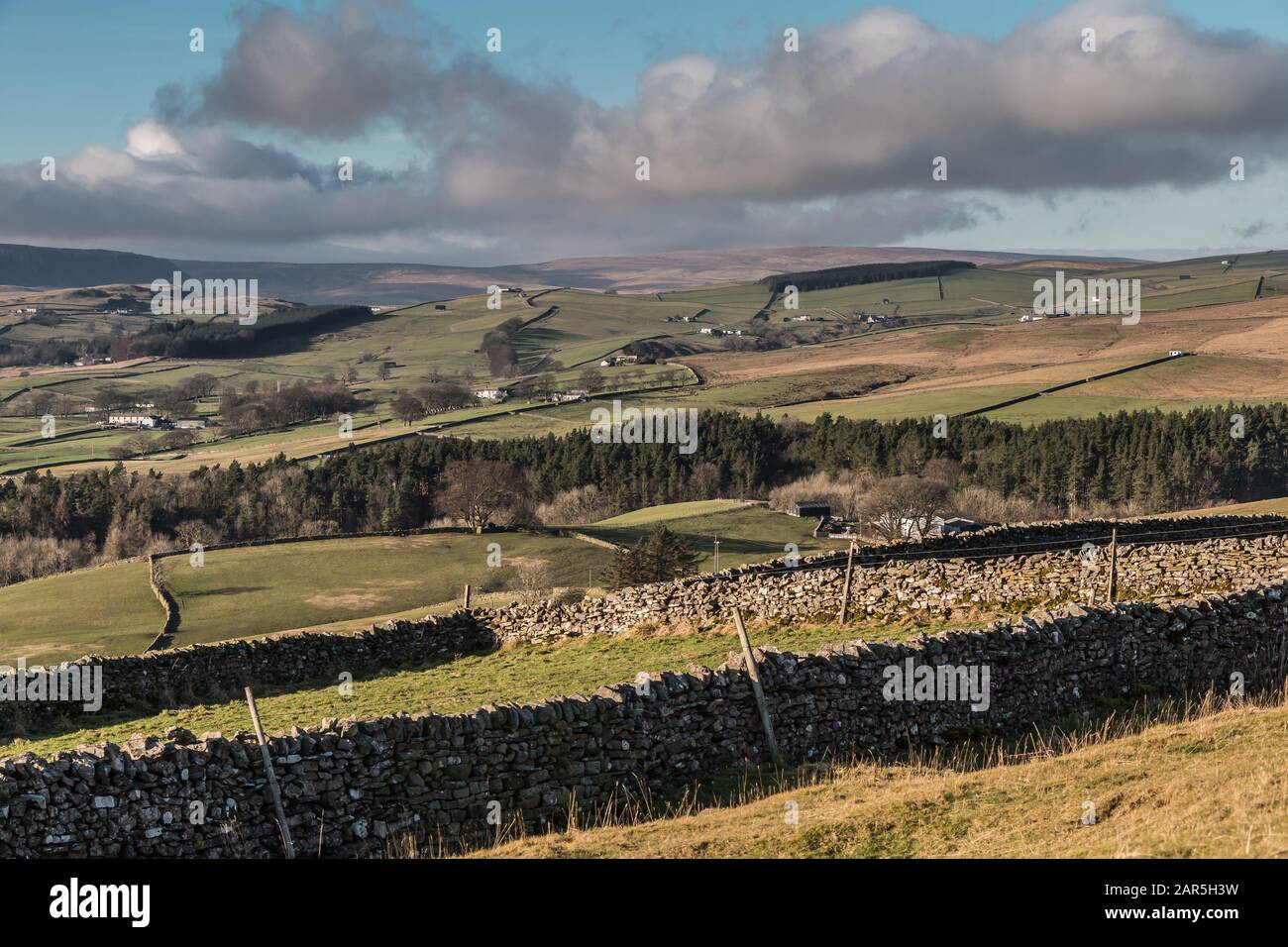 Teesdale Landscape, Upper Teesdale and Ettersgill in strong winter sunshine, taken from Stable Edge above Newbiggin Stock Photo