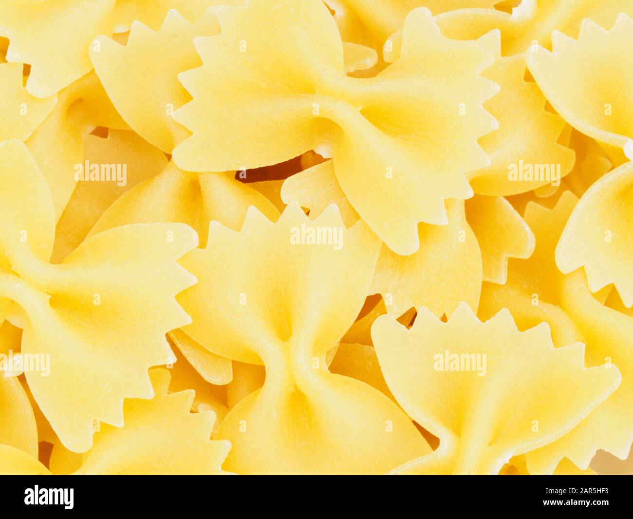 Background from pasta type bow. Healthy eating concept Stock Photo Alamy