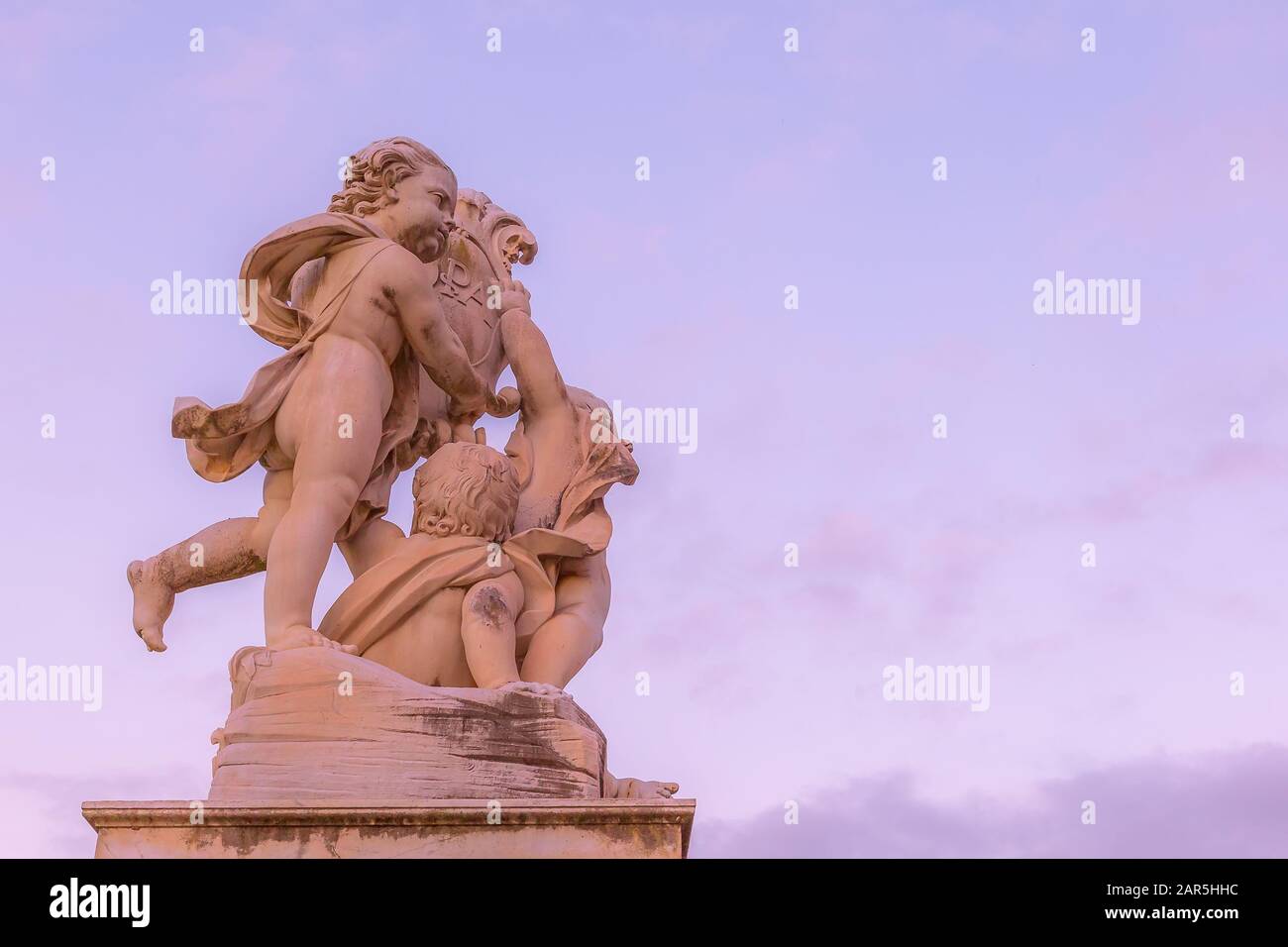 Statue of angels on Square of Miracles in Pisa, Italy sunset view, copy space background Stock Photo