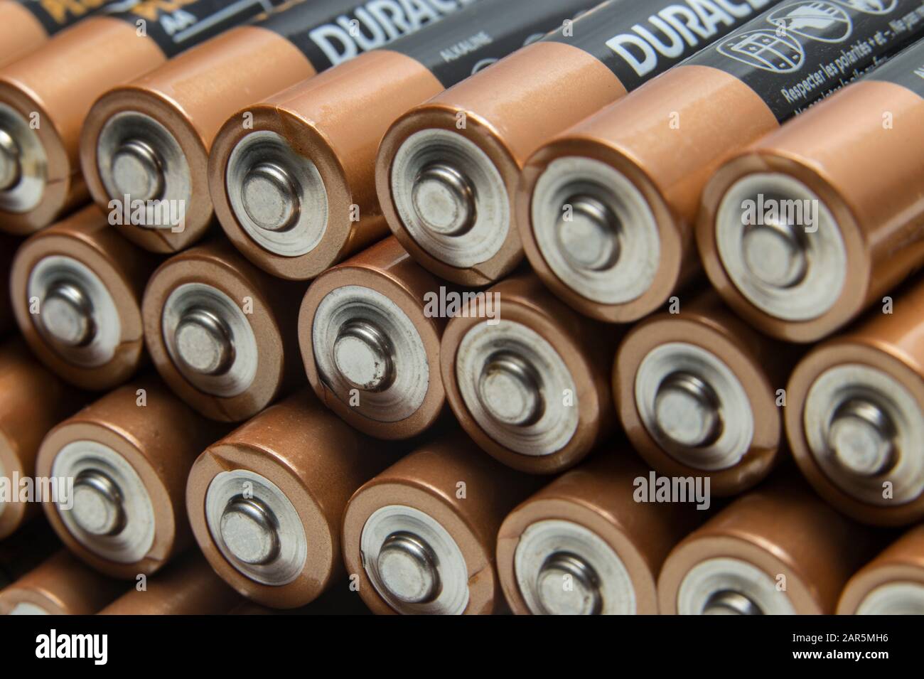 Stack, row of alkaline batteries, AA, AAA, cells,power, not recycleable, non recycle. Stock Photo
