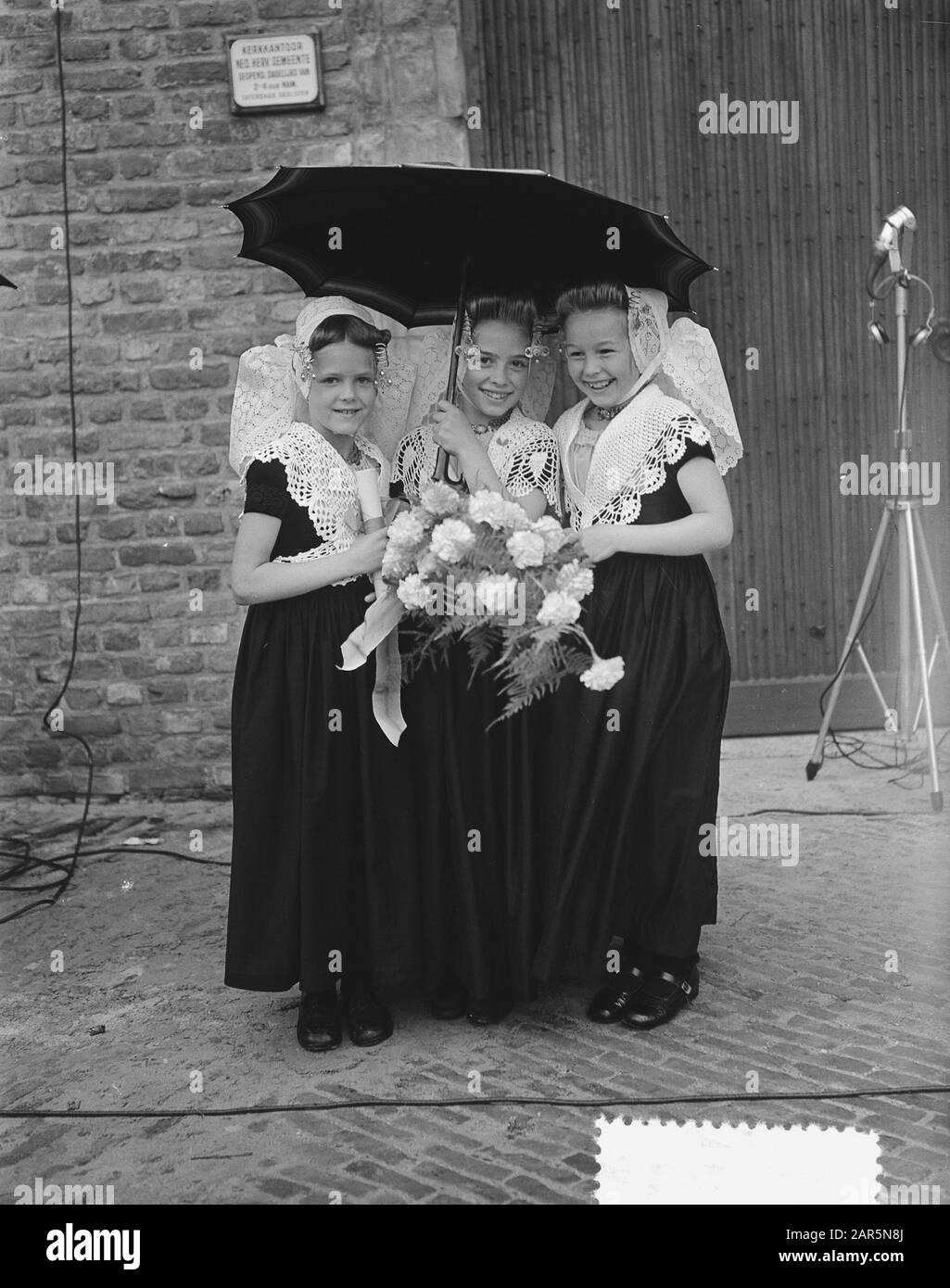 Queen Juliana and Prince Bernhard visit Walcheren Girls in traditional
