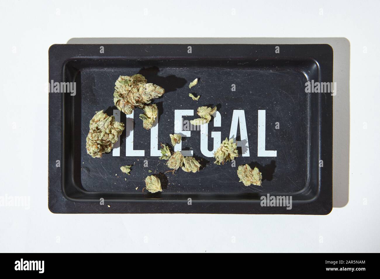 Cannabis Flower on ILLEGAL rolling tray Stock Photo