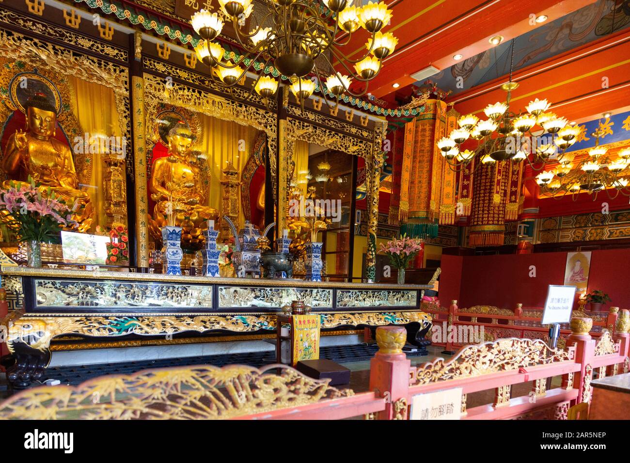 Po Lin Monastery interior, Lantau Island Hong Kong - an ornate buddhist shrine inside the Po Lin Monastery, Ngong PIng, Lantau Island Hong Kong Asia Stock Photo
