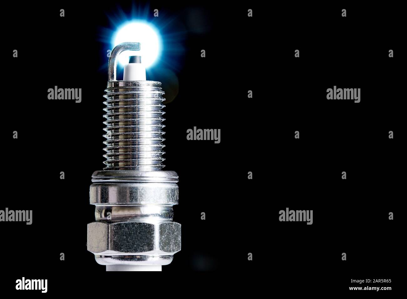 Spark plug for internal combustion engine.Сopy space Stock Photo - Alamy