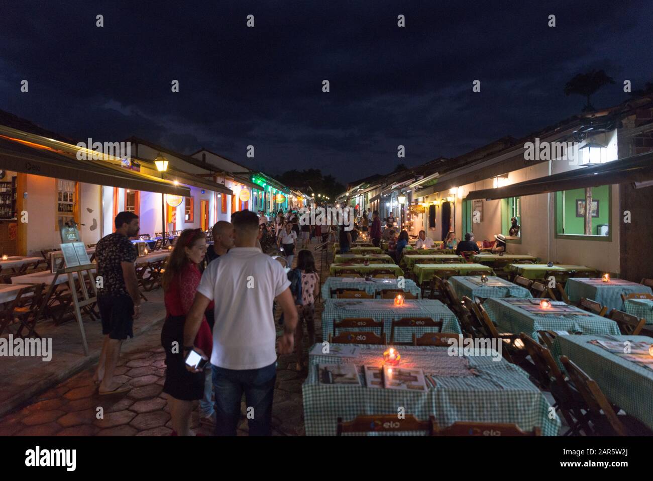 Pirenópolis, Goiás, Brazil. 18th July 2019. Nightlife at Rua do Lazer in Pirenópolis. Tourists chosing restaurants in the evening. Stock Photo