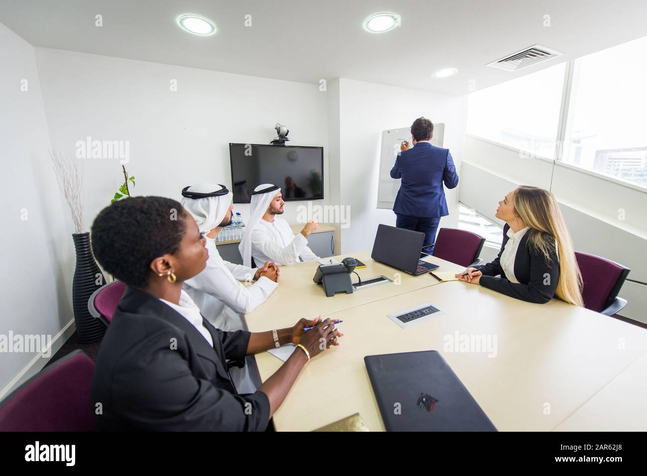 Multiracial group of business people having a meeting in a office ...