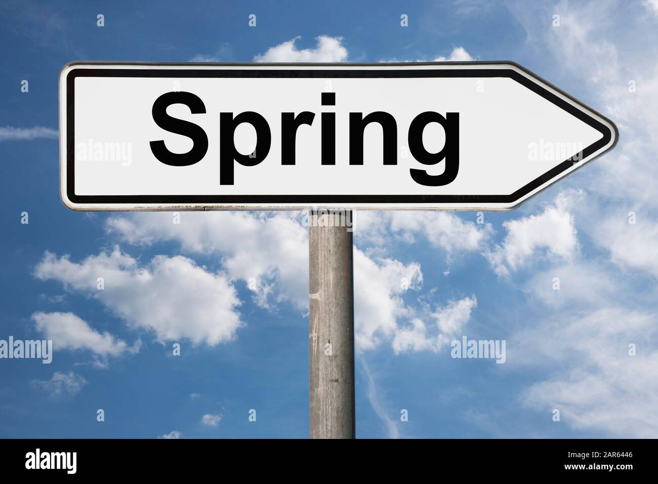 Detail photo of a signpost with the inscription Spring Stock Photo