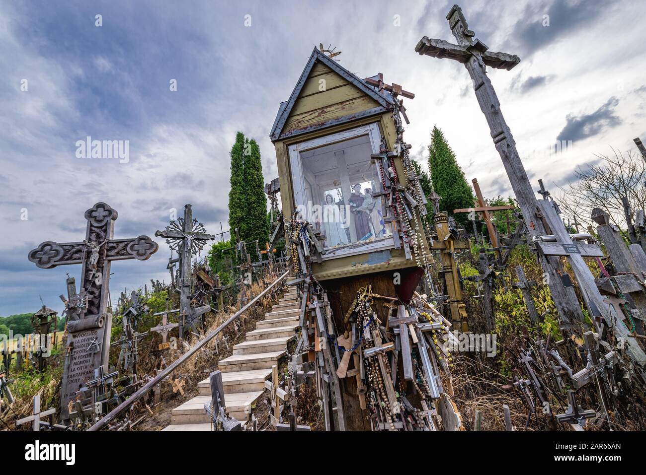 Small shrine and crosses on Hill of Crosses in Lithuania Stock Photo