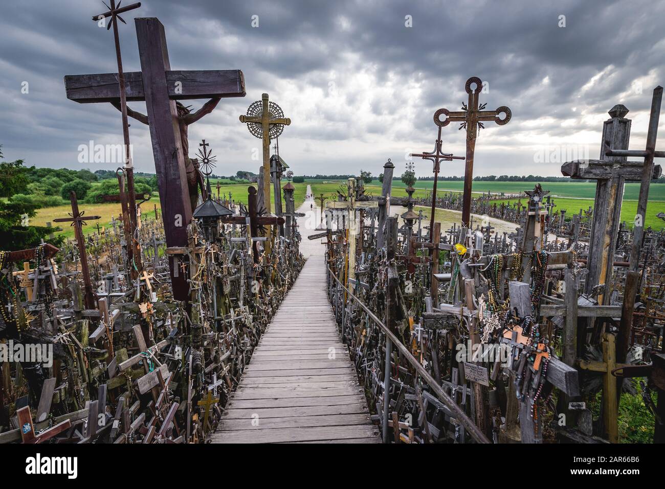 Wooden crosses and stairs to the top of Hill of Crosses in Lithuania Stock Photo