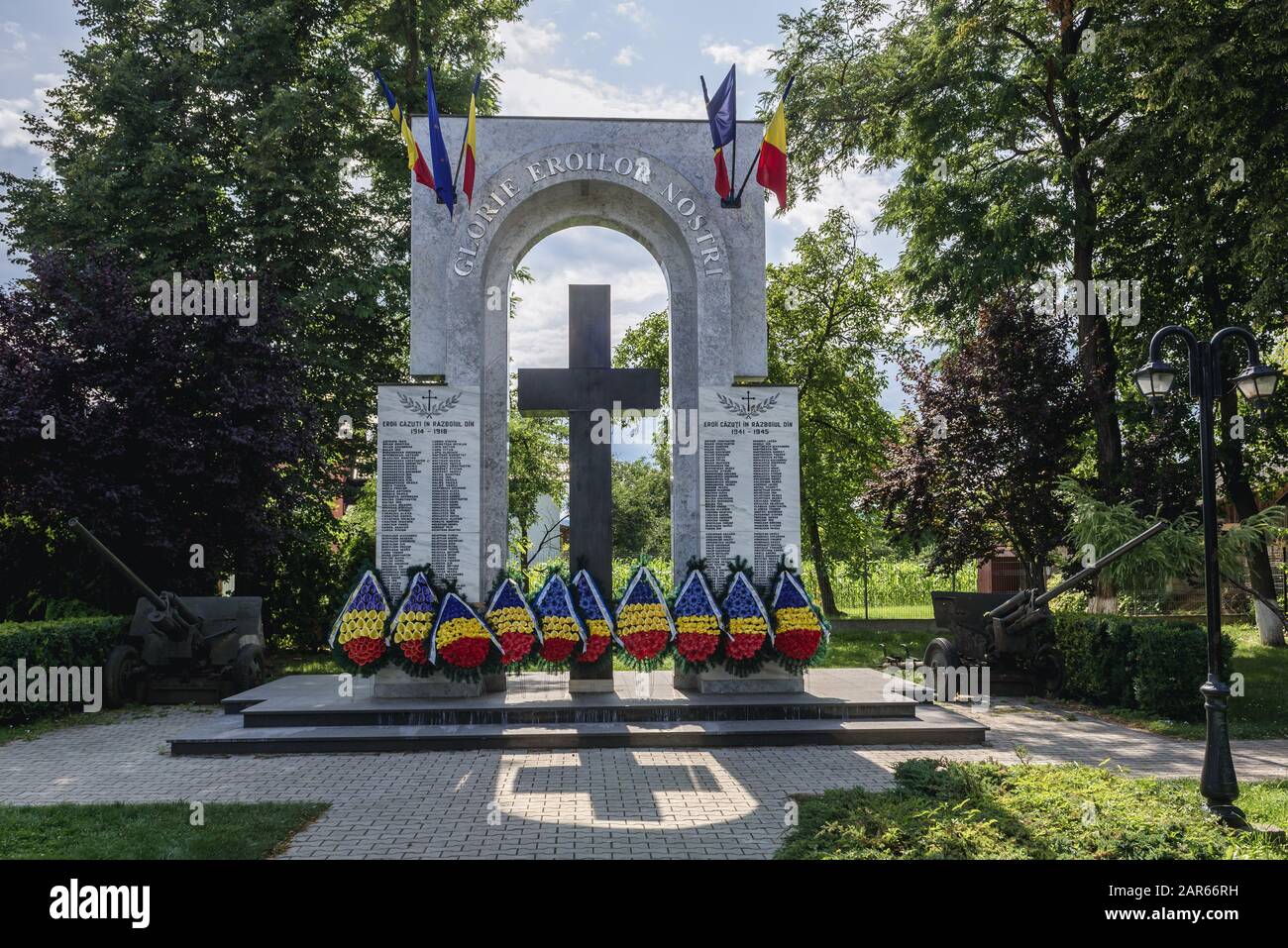 War memorial with inscription Glory to Our Heroes in Marginea village, famous for production of black pottery, located in Suceava County, Romania Stock Photo