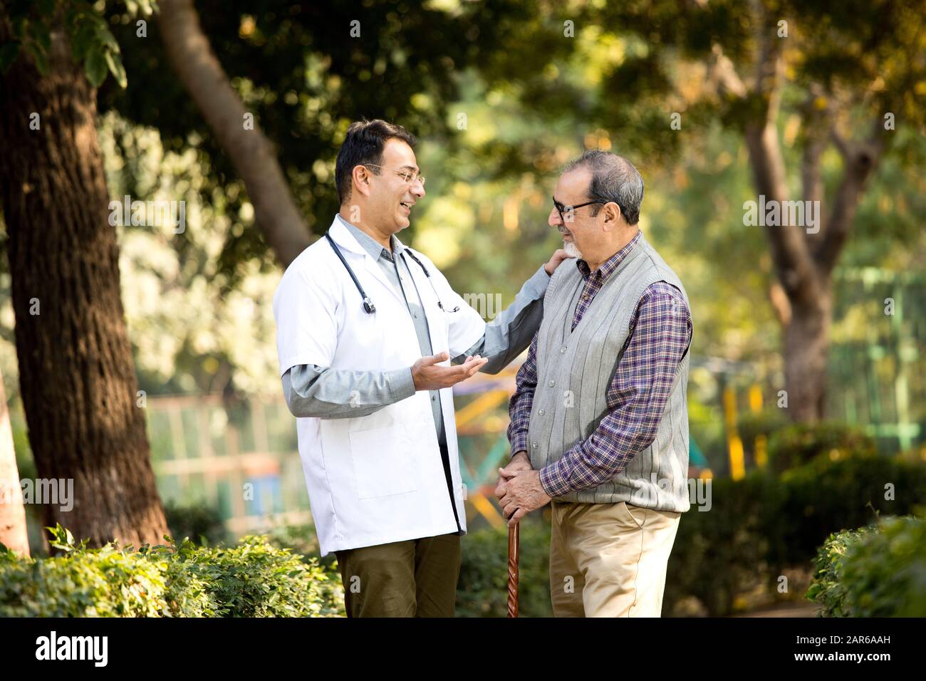 Old man laughing hospital hi-res stock photography and images - Alamy
