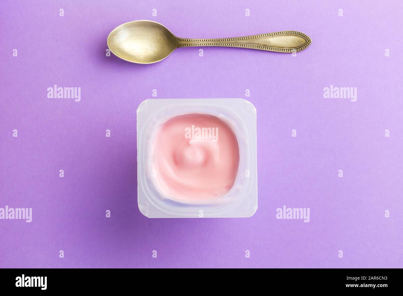 Healthy strawberry fruit flavored yoghurt with natural coloring in