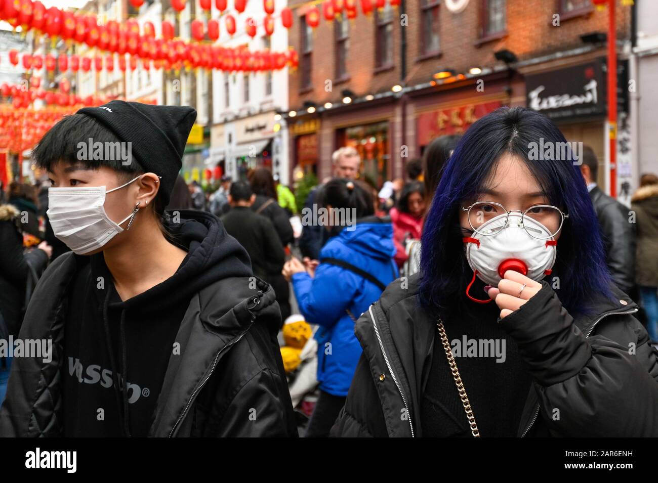 Download London Uk 26 January 2020 Women Wear Facemasks In Chinatown During Chinese New Year Celebrations For PSD Mockup Templates