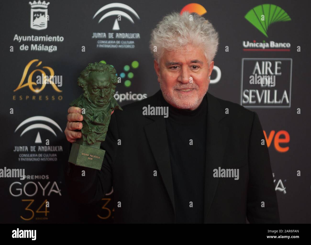 Malaga, Spain. 26th Jan, 2020. Spanish director Pedro Almodovar poses with his Goya award for the best director on 'Dolor y Gloria' (Pain and Glory) during the 34th edition of Spanish Film Academy's Goya Awards ceremony, at Jose Maria Martin Carpena Sport Palace. Credit: SOPA Images Limited/Alamy Live News Stock Photo