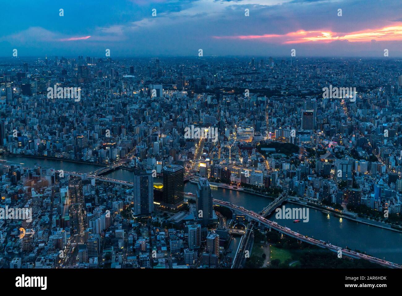 Cityscape of Tokyo from the Skytree at sunset. From the observation deck is possibile to see Asahi building headquarters and Sensoji temple Stock Photo