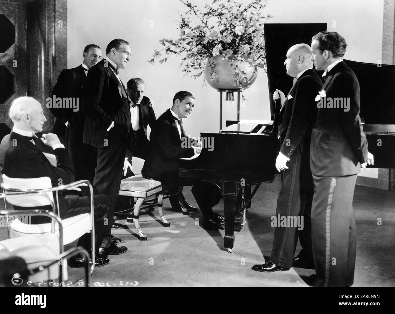 HUGH BUCKLER as Lord Gainsford standing to left of RONALD COLMAN as Robert Conway in cut scene from LOST HORIZON 1937 director FRANK CAPRA novel JAMES HILTON screenplay ROBERT RISKIN Columbia Pictures Stock Photo