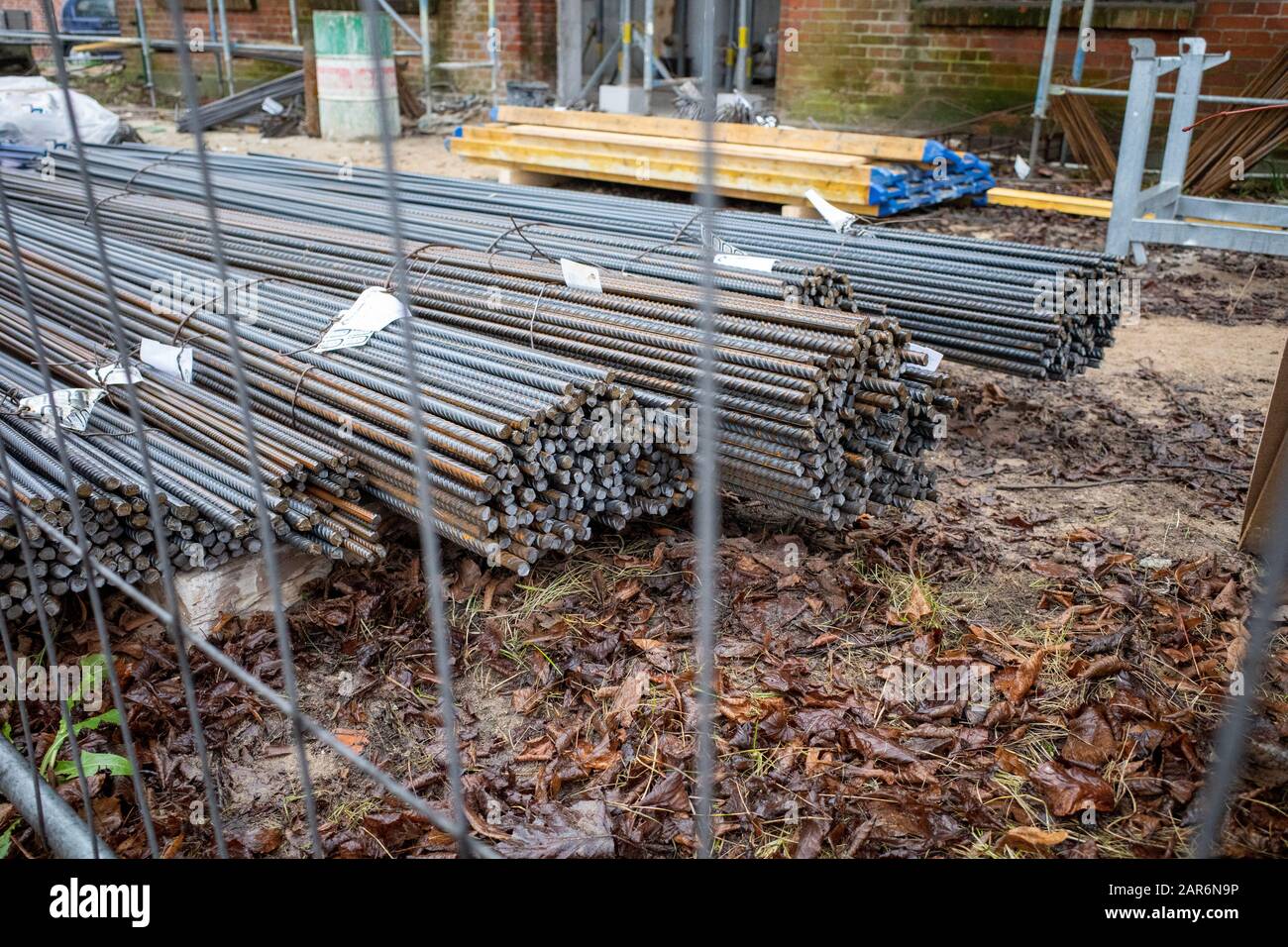 on a building site there are many bundles of steel struts for braiding