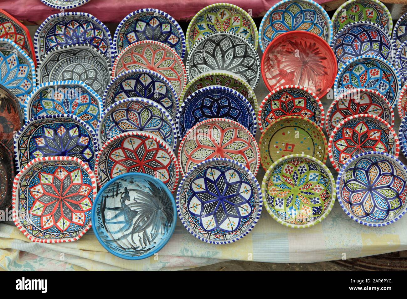 Typical Tunisian colorful decorated clay bowls for sale Stock Photo