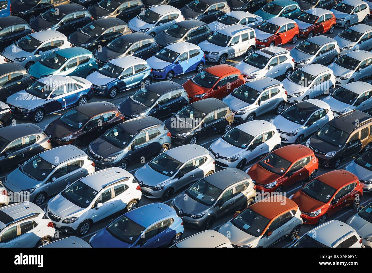 Rows of new cars waiting to be sold. Stock Photo