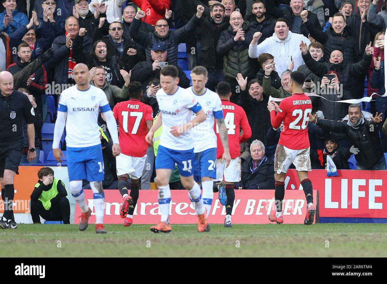 Mason Greenwood of Manchester United (26) celebrates after scoring his  teams 6th goal as a roll of toilet paper is thrown from the crowd. The  Emirates FA Cup, 4th round match, Tranmere