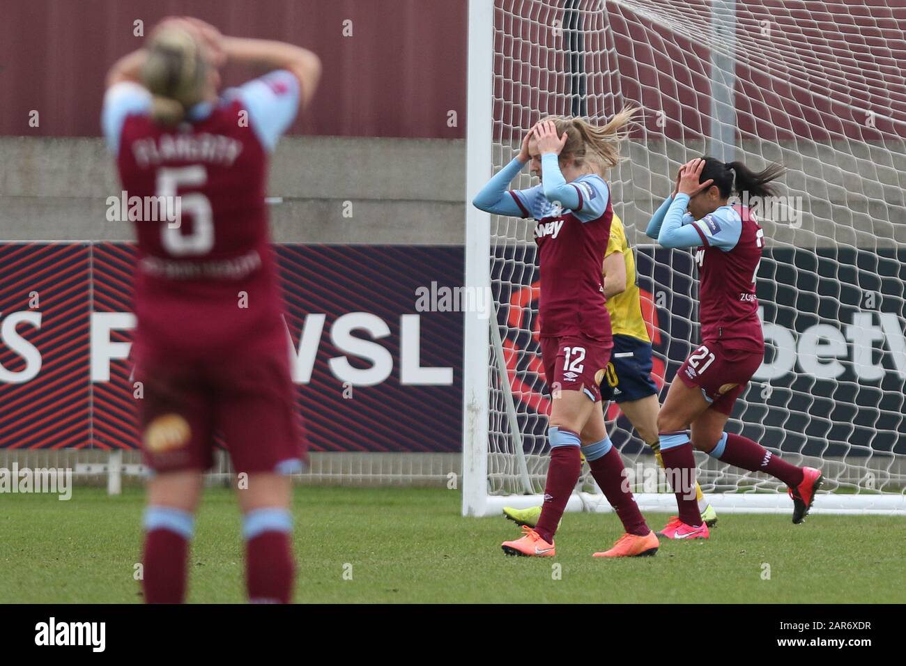 Romford, UK. 26th Jan, 2020.  Gilly Flaherty of West Ham United Women, Kate Longhurst of West Ham United Women and Kenza Dali of West Ham United Women reacting to a missed shot during the Women's FA Cup match between West Ham United and Arsenal at the Rush Green Stadium, Romford, London on Sunday 26th January 2020. (Credit: Jacques Feeney | MI News) Photograph may only be used for newspaper and/or magazine editorial purposes, license required for commercial use Credit: MI News & Sport /Alamy Live News Stock Photo