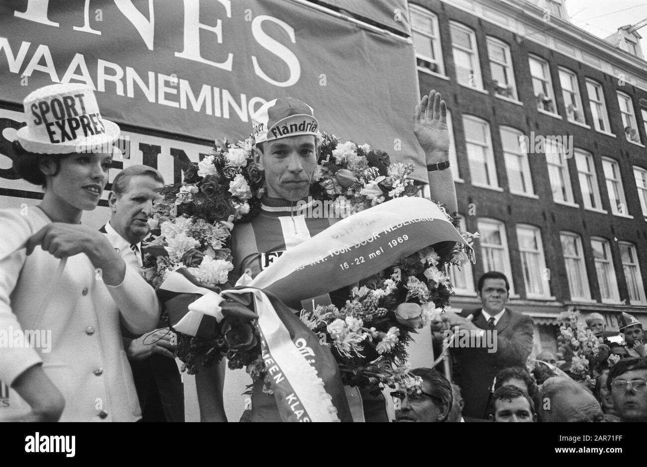 Olympias Toer, winner Peter Legierse will be honoured in Amsterdam finish Date: May 22, 1969 Location: Amsterdam, Noord-Holland Keywords: Winners, finish, cycling Stock Photo