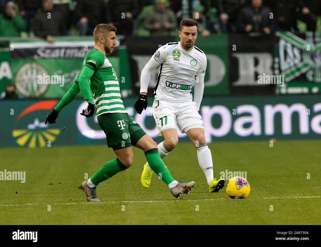 BUDAPEST, HUNGARY - MARCH 2: (r-l) David Markvart of DVTK controls the ball  next to Roland Varga of Ferencvarosi TC during the Hungarian OTP Bank Liga  match between Ferencvarosi TC and DVTK