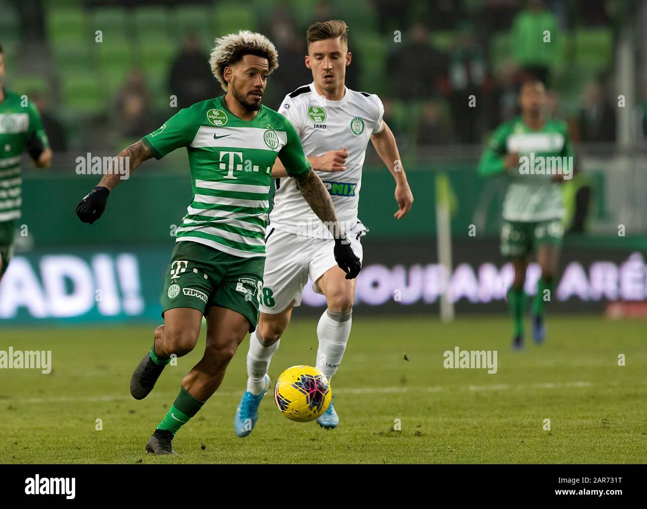 (r-l) Isael da Silva Barbosa of Ferencvarosi TC challenges Dzenan