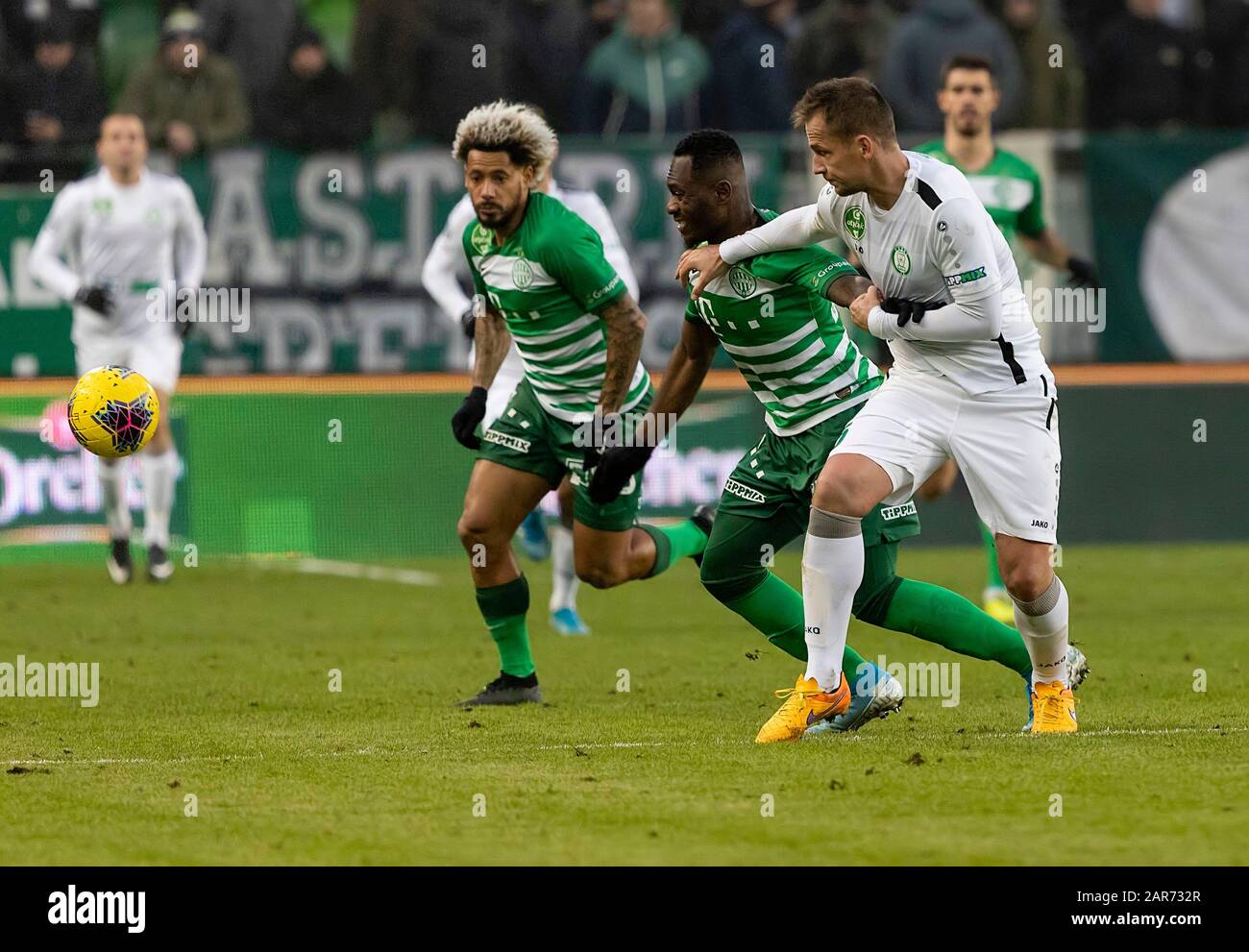 (r-l) Isael da Silva Barbosa of Ferencvarosi TC challenges Dzenan