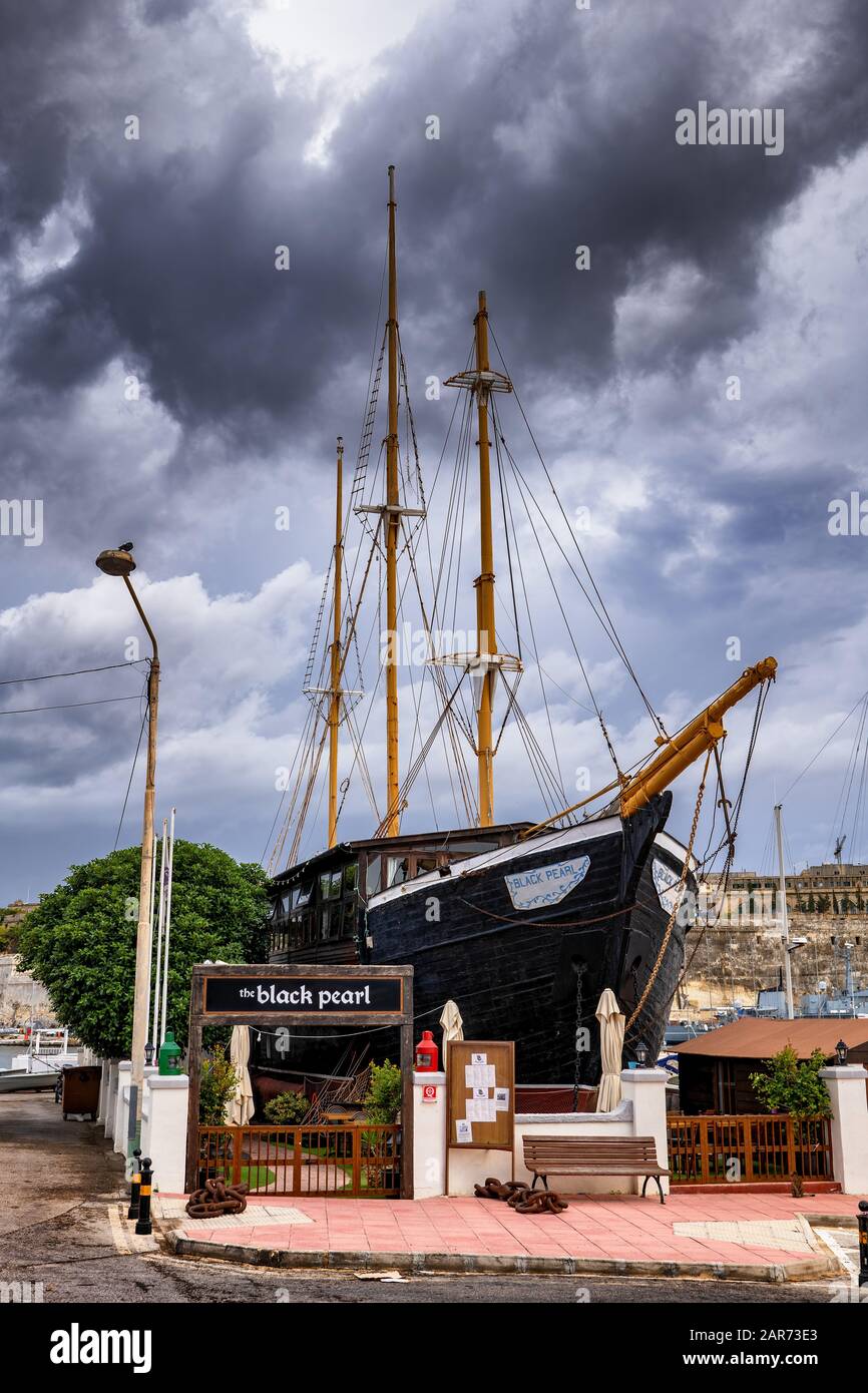 Black Pearl restaurant ship and pub in Ta'Xbiex, Malta, wooden trading schooner built in Sweden in 1909 as Black Opal Stock Photo