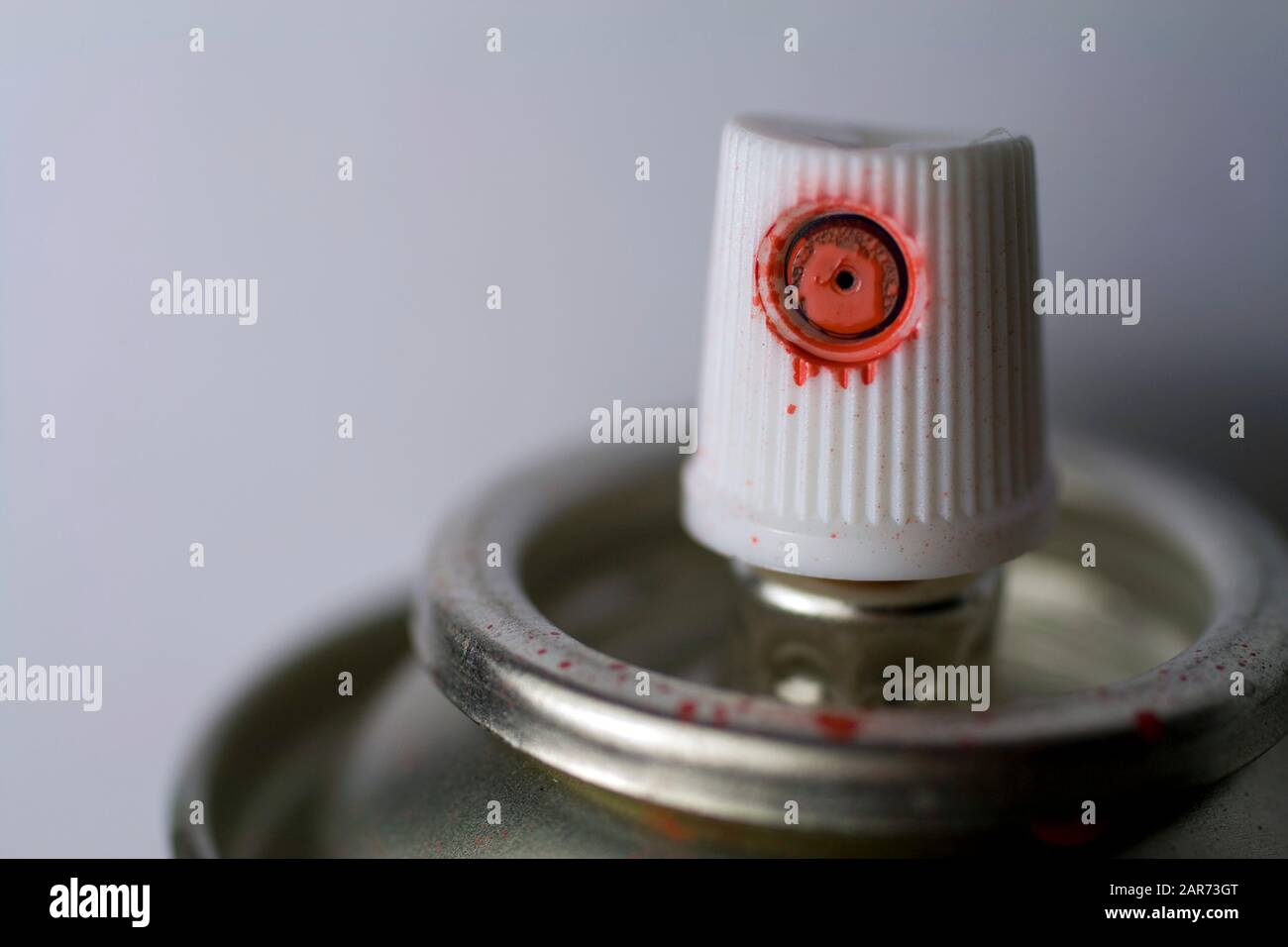 Close up shot of a spray can nozzle Stock Photo - Alamy