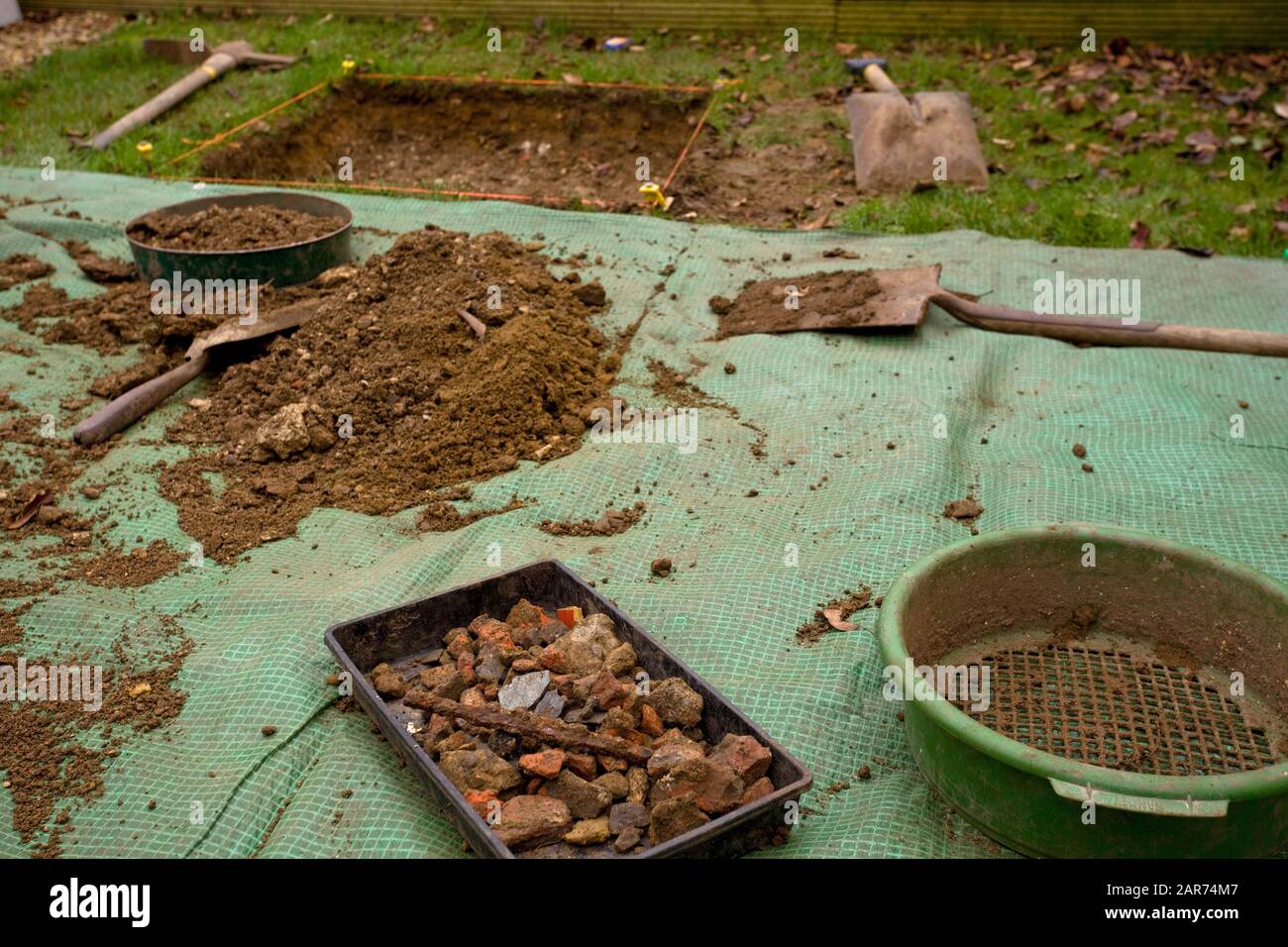Archaelogical dig in garden Stock Photo
