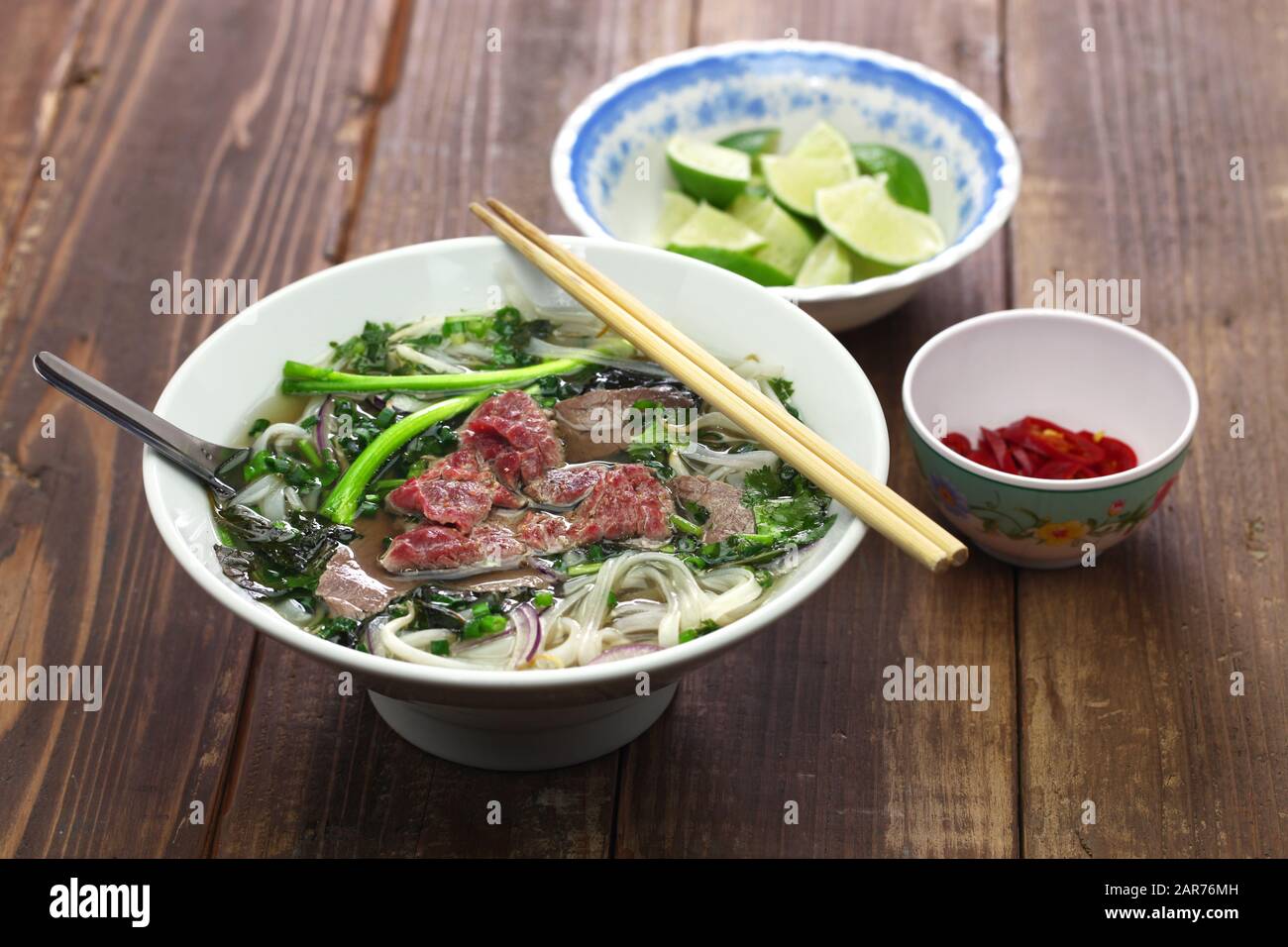 homemade pho bo, vietnamese beef noodle soup Stock Photo - Alamy