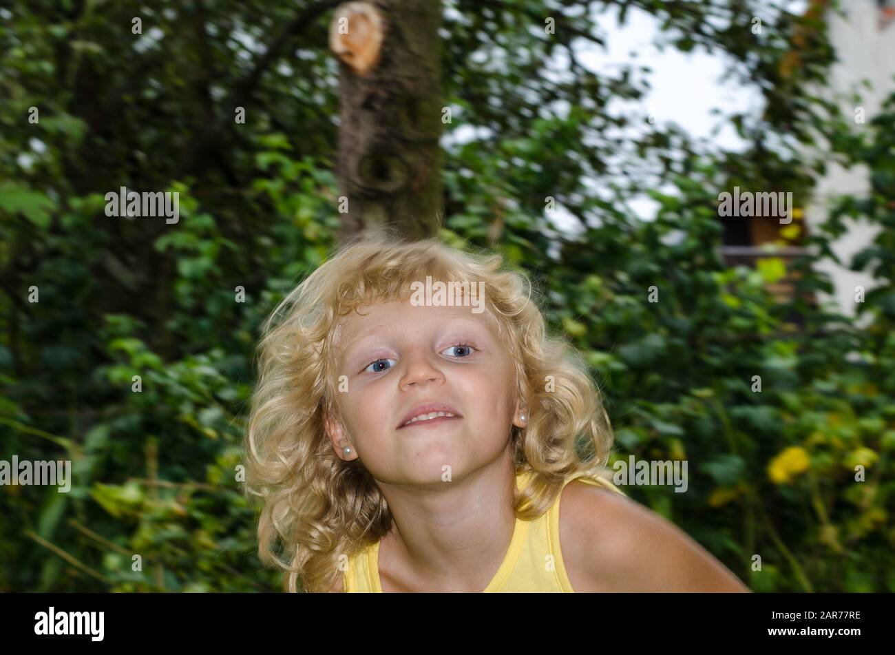 Happy blond girl hi-res stock photography and images - Alamy